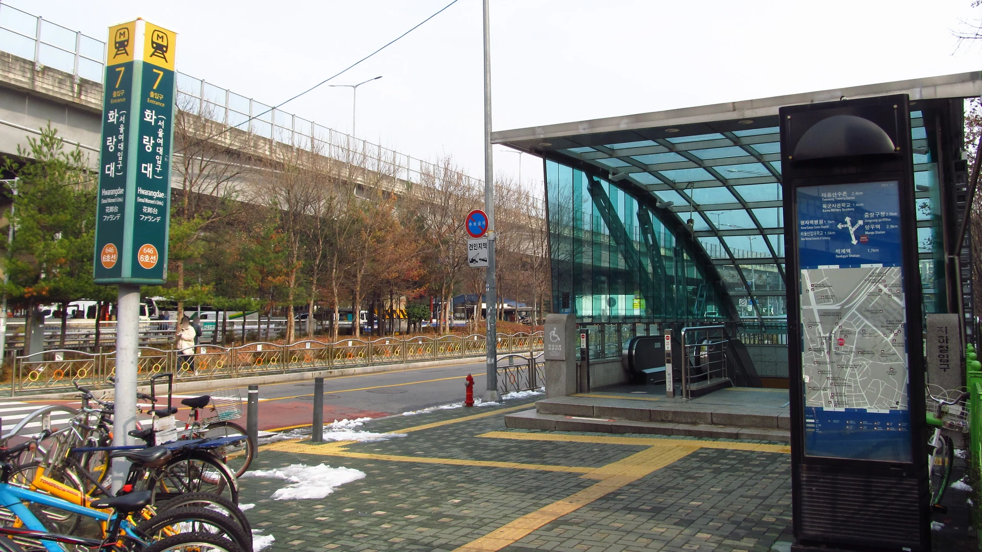 Seoul subway entrance with elevator accessibility signage at Hwarangdae Station Exit 7